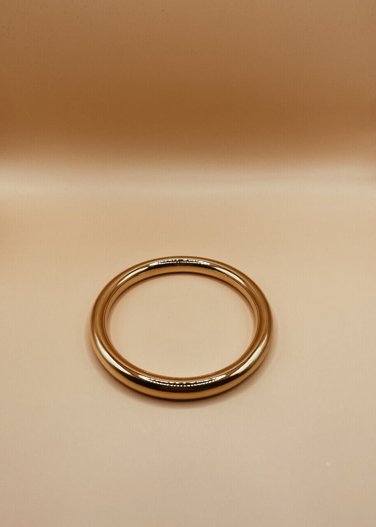 Roundabout Chimbai Bangle in Glossy Gold