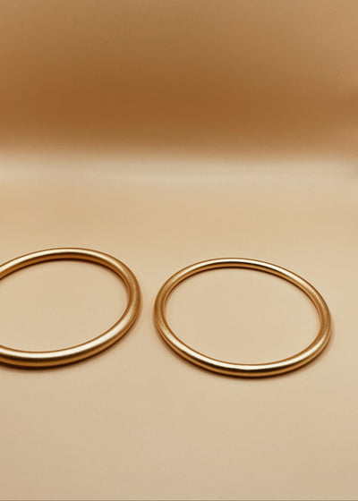Narrow Roundabout Chimbai Bangle in Matte Gold