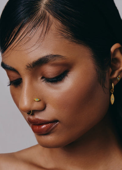 Evil Eye Nose Pin in Gold Tone