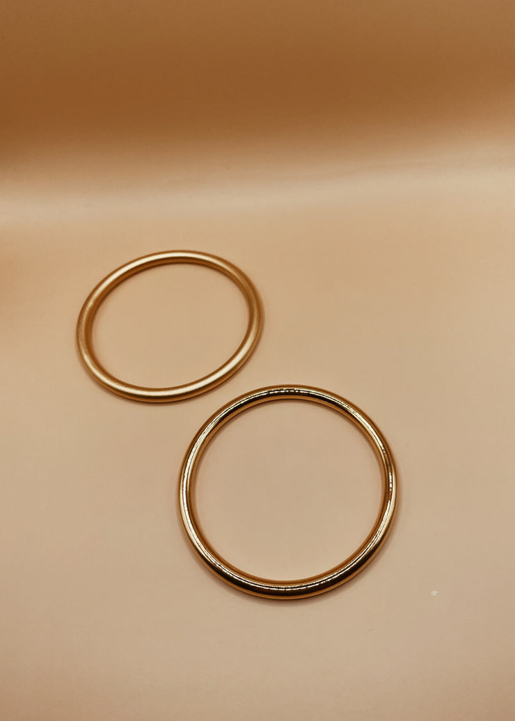 Roundabout Chimbai Bangle in Glossy Gold