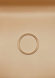 Narrow Roundabout Chimbai Bangle in Matte Gold