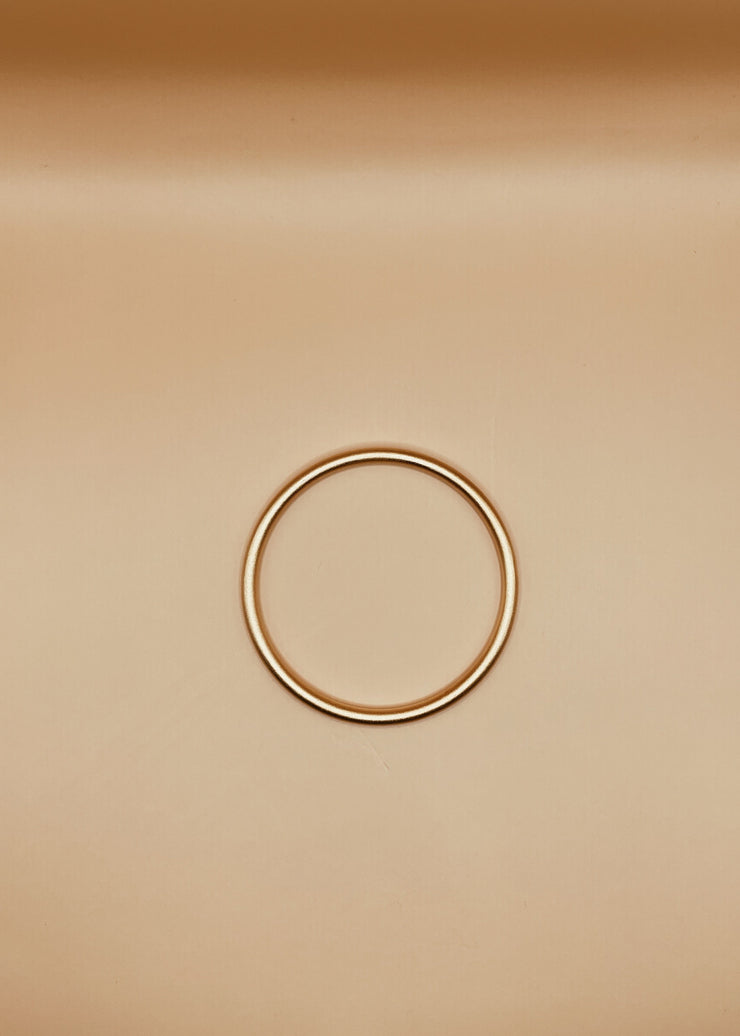 Narrow Roundabout Chimbai Bangle in Matte Gold