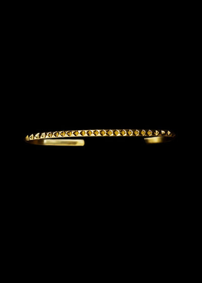 Single Line Pyramid Wrist Cuff in Gold Tone