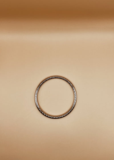 Narrow Roundabout Chimbai Bangle in Silver Tone