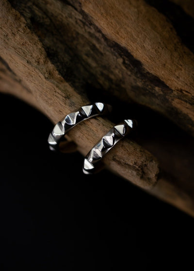 Single Line Pyramid Hoops in Silver Tone