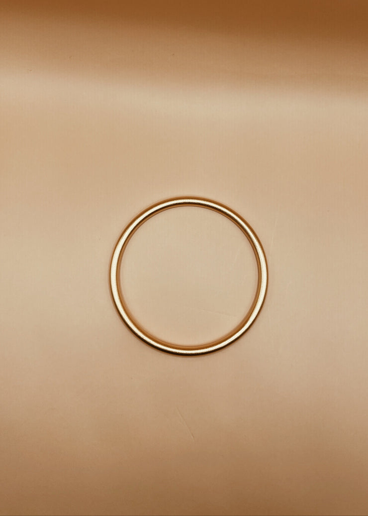 Narrow Roundabout Chimbai Bangle in Matte Gold