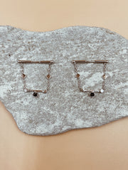 Combust Barbell Earrings in Silver Tone