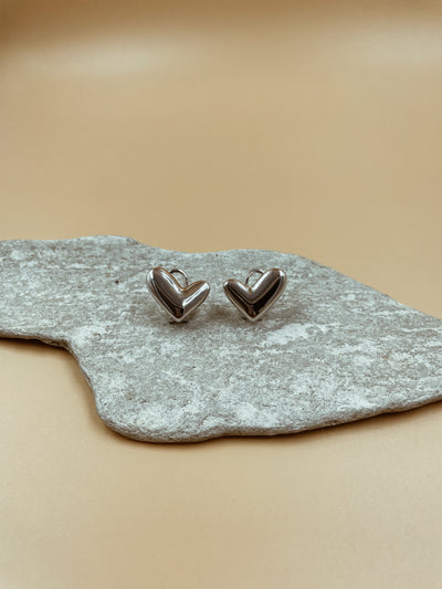 Intuitive Abstract Heart Studs in Silver Tone